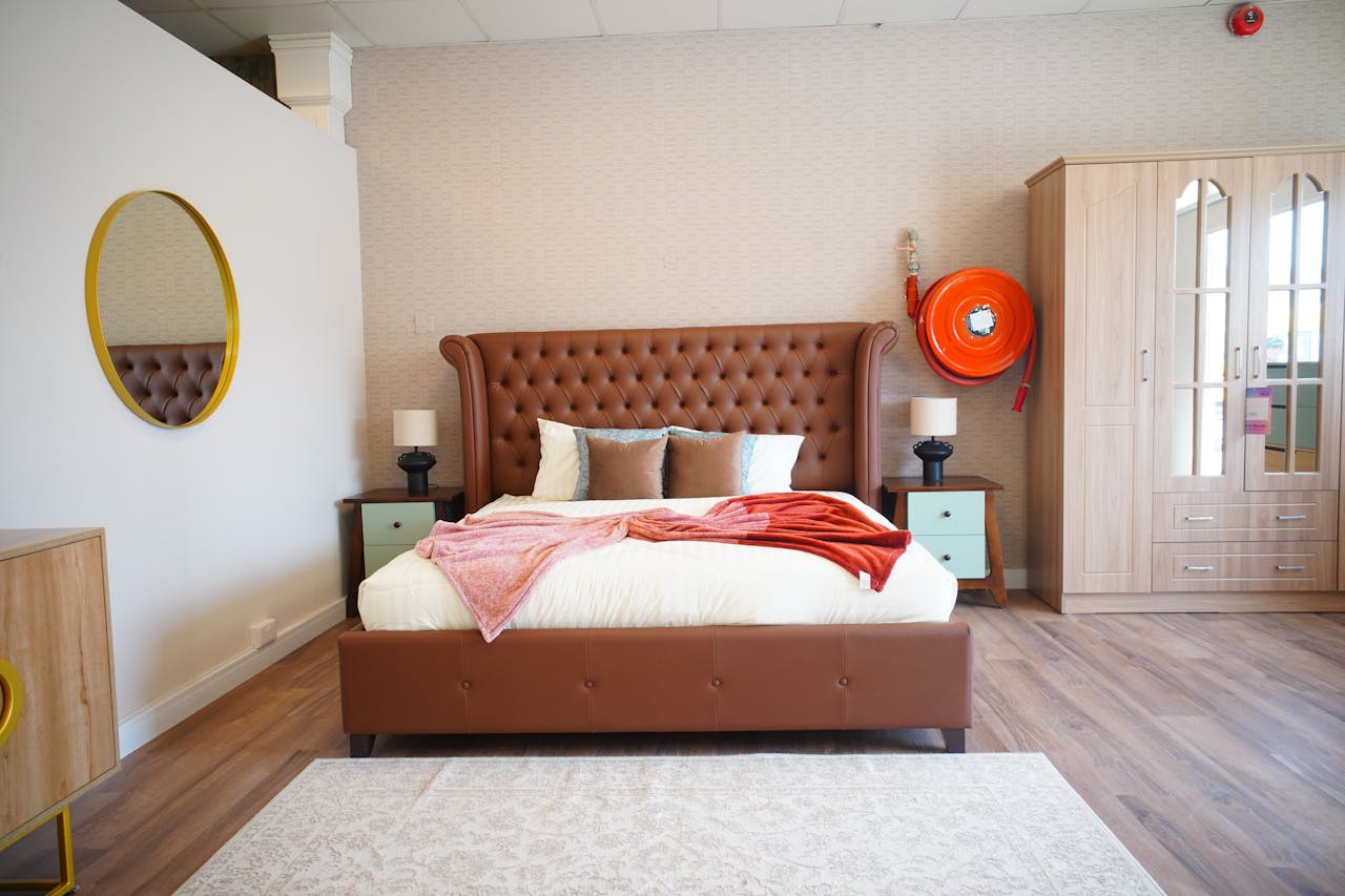 ours-journey Explore a stylish modern bedroom featuring luxury furniture and warm tones.